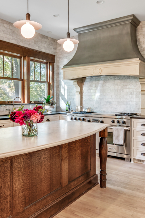 Kitchen with island and unique lighting