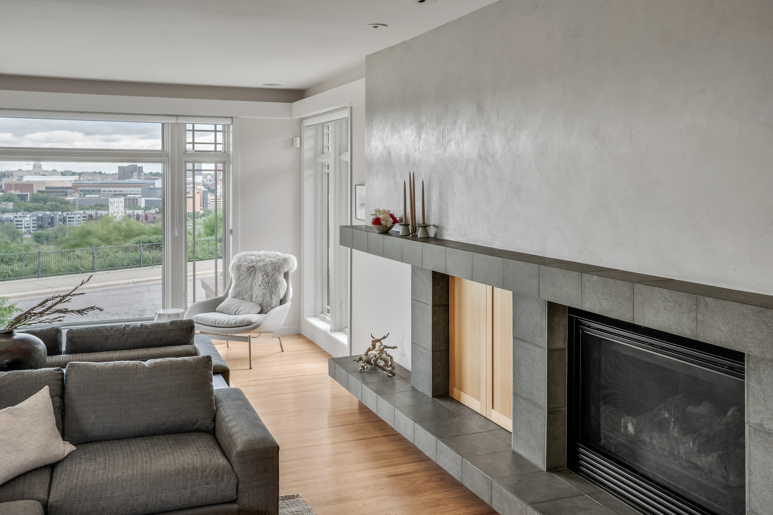 Family Room fireplace wall and window with chair